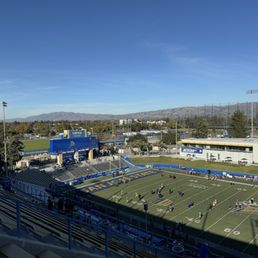 View from section 209, row 20, seat 12. Metal bleacher seating mostly throughout the stadium, including up here, no back support either.