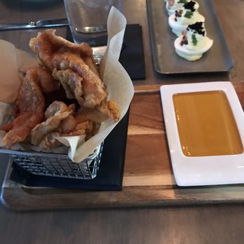 Carson Kitchen - Crispy chicken skin with smoked honey. - New American Near Me - Las Vegas, Nevada Carson Kitchen - Crispy chicken skin with smoked honey. - New American Near Me - Las Vegas, Nevada