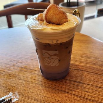 Viland Coffee - Ube coffee latte with creme brulee topping with mini croissant (20 oz) - Coffee & Tea Near Me - Westminster, California Viland Coffee - Ube coffee latte with creme brulee topping with mini croissant (20 oz) - Coffee & Tea Near Me - Westminster, California