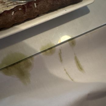 Surena Persian Cuisine - Tablecloth with stains - Persian/Iranian Near Me - Centennial, Colorado Surena Persian Cuisine - Tablecloth with stains - Persian/Iranian Near Me - Centennial, Colorado