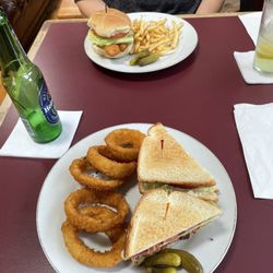 Pub 116 - BLT club with onion rings as well as a haddock sandwich, and fries