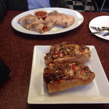 Napolitano's Brooklyn Pizza - Stromboli and steak and cheese hero. - Italian Near Me - Cranston, Rhode Island Napolitano's Brooklyn Pizza - Stromboli and steak and cheese hero. - Italian Near Me - Cranston, Rhode Island