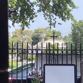 Restoration Cafe - The iron fences were neat. The courtyard had a cozy tucked away vibe and I enjoyed eating outside. - Cafes Near Me - Manchester, New Hampshire