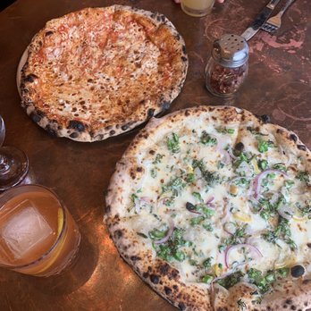 Lolita's Pizza - Broccolini pizza in the front & New Yorker pizza in back - Salad Near Me - Poughkeepsie, New York Lolita's Pizza - Broccolini pizza in the front & New Yorker pizza in back - Salad Near Me - Poughkeepsie, New York