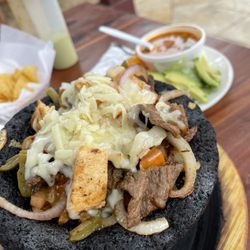 La Parrillada - Molcajete with mixed chicken and beef