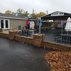 Cedar Inn - Great outdoor hangout area w roof overhead. Not afraid of rain or snow!