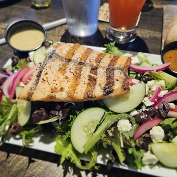 Celebration Brewing Company - The Big Salad topped with grilled salmon - Breweries Near Me - Celebration, Florida