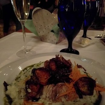 Ostra - Barramundi and brussel sprouts on risotto - get it! - New American Near Me - San Antonio, Texas