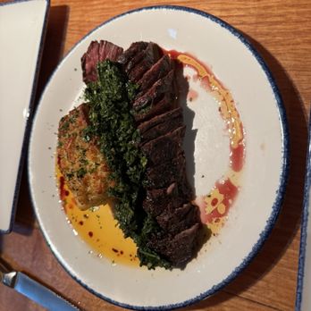 Sylvan Table - Streak with a chimichurri sauce and potato pave - New American Near Me - Sylvan Lake, Michigan Sylvan Table - Streak with a chimichurri sauce and potato pave - New American Near Me - Sylvan Lake, Michigan