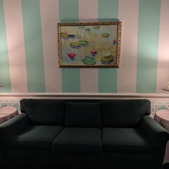 Grand Hotel - Hallway art and couch - Hotels Near Me - Mackinac Island, Michigan