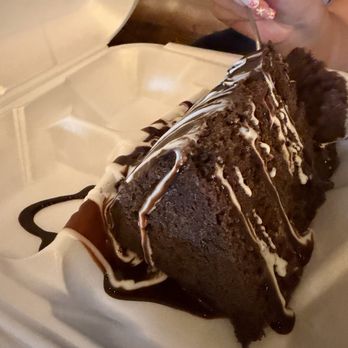 R'z Cafe & Catering - Chocolate Ganache Cake. Giant slice to go. - Cafes Near Me - Fort Branch, Indiana R'z Cafe & Catering - Chocolate Ganache Cake. Giant slice to go. - Cafes Near Me - Fort Branch, Indiana