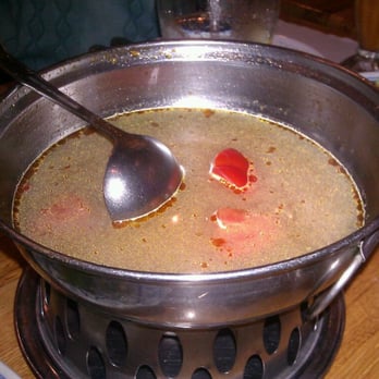 Baan Thai - Half eaten Tom yum soup with chicken - Thai Near Me - Seaside, California Baan Thai - Half eaten Tom yum soup with chicken - Thai Near Me - Seaside, California