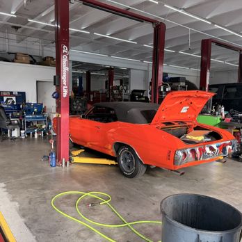 Expert Auto Repair - My car going on the Lift for tire balancing on their road force balancing . A unique way to balance tires - Auto Repair Near Me - Margate, Florida Expert Auto Repair - My car going on the Lift for tire balancing on their road force balancing . A unique way to balance tires - Auto Repair Near Me - Margate, Florida