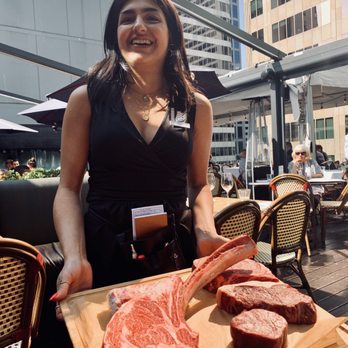 Black+Blue Vancouver - Our server, Tina, explains the cuts of beef! - Steakhouses Near Me - Vancouver, British Columbia