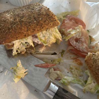 Heroes Cafe - a half eaten sandwich and a knife - Burgers Near Me - Portland, Oregon Heroes Cafe - a half eaten sandwich and a knife - Burgers Near Me - Portland, Oregon