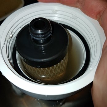 Water Group 7 - Replacing a dirty filter - Water Purification Services Near Me - Honolulu, Hawaii