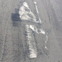 Horribly marked arrows in parking lot
