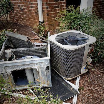 Camden Lake Pine Apartments - Nonworking HVAC unit w/ exposed wires, rust - Apartments Near Me - Apex, North Carolina Camden Lake Pine Apartments - Nonworking HVAC unit w/ exposed wires, rust - Apartments Near Me - Apex, North Carolina