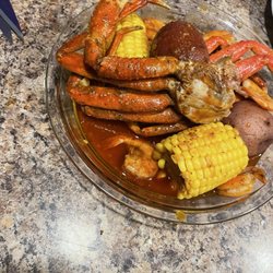 Lobster King Cajun Seafood & Wings - G5. Snow Crab Legs. Shrimp Dinner S2. Potato S1. Corn all rolled up with that "Juicy Sauce"