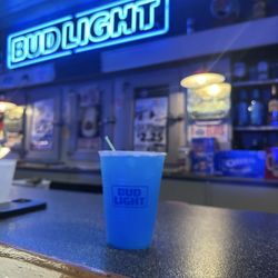 Outpost Bar - Tito's + soda (added flavor packet)