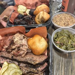 Brisket, Bonbons, Pulled Pork, Collard Greens, Brisket Dirty Rice, and Burnt Ends Brisket, Bonbons, Pulled Pork, Collard Greens, Brisket Dirty Rice, and Burnt Ends