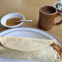 Bill's Place - Meat lovers burrito with homemade hot sauce.