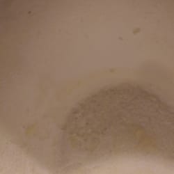 Oliver's Bar and Grill - Styrofoam cup my mashed potatoes came in. Melted the styrofoam.