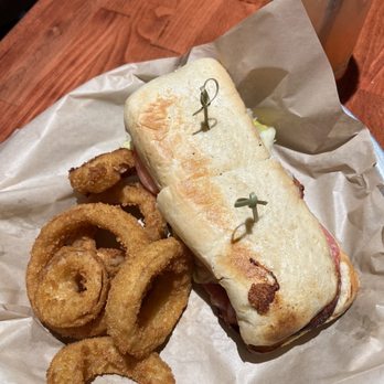 Mad Anthony's Auburn Tap Room - Italian sandwich with six onion rings. - Pizza Near Me - Auburn, Indiana Mad Anthony's Auburn Tap Room - Italian sandwich with six onion rings. - Pizza Near Me - Auburn, Indiana