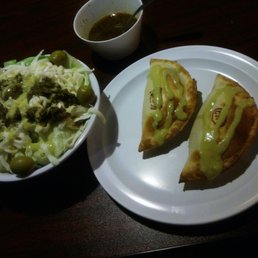 A nice little salad with chimichurri sauce and salsa and couple of empanadas makes for a pleasant change of pace.