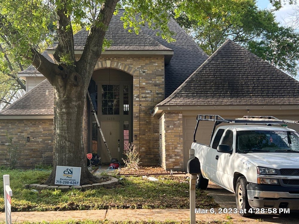 Slide of CM Roofing Pros