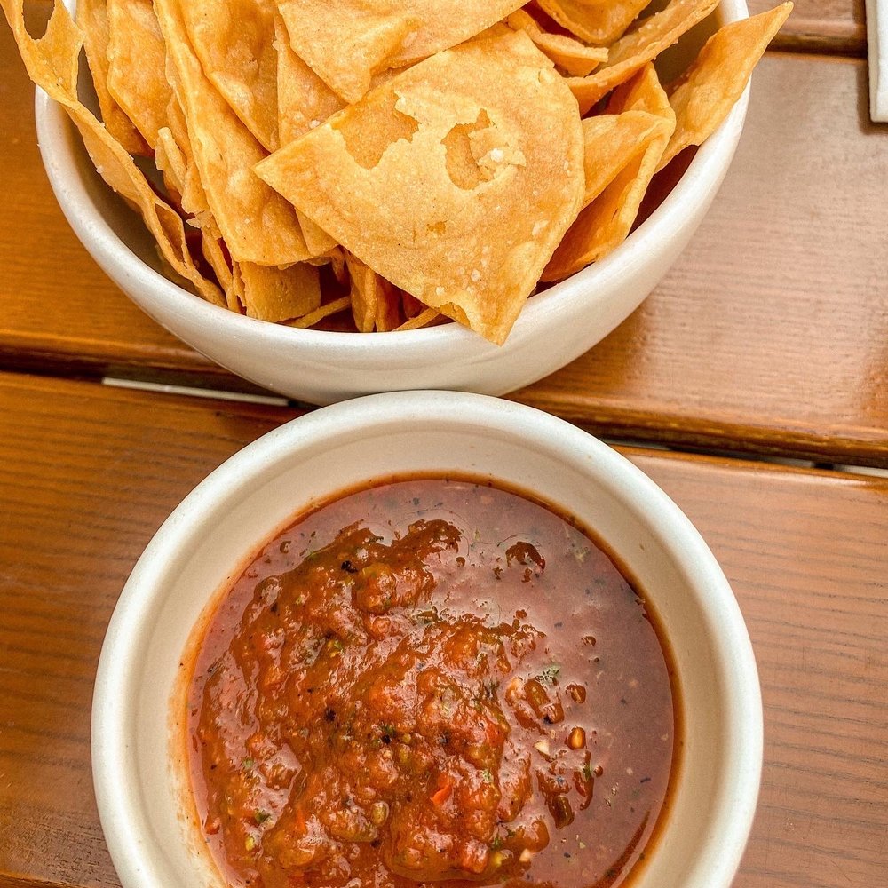 Penca - a bowl of chips and a bowl of salsa - Mexican Near Me - Tucson, Arizona