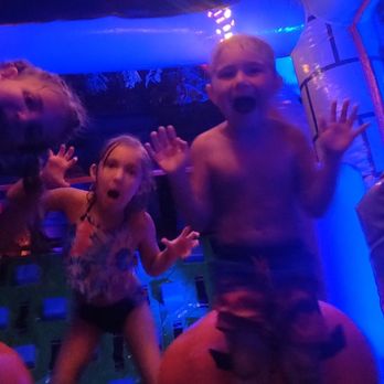 Tlg  Inflatables - kids being spooky - Bounce House Rentals Near Me