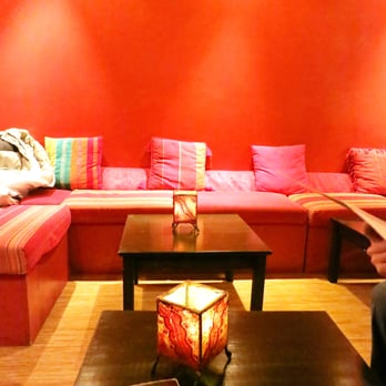 Orienthé - a living room with a couch and a table - Tea Rooms Near Me - Montreal, Quebec Orienthé - a living room with a couch and a table - Tea Rooms Near Me - Montreal, Quebec