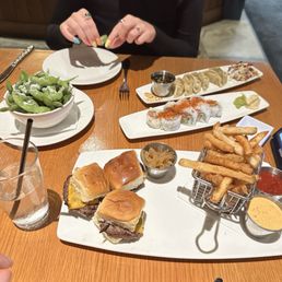 KG Sliders & Fries** Edamame Chicken Potstickers and wife's sushi KG Sliders & Fries** Edamame Chicken Potstickers and wife's sushi