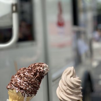 Mister Softie - a person holding an ice cream cone - Ice Cream & Frozen Yogurt Near Me