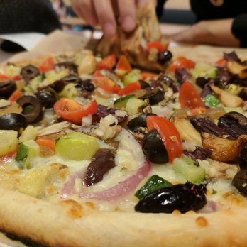 Blaze Pizza - macro shot of veggie pizza - Salad Near Me - Claremont, California Blaze Pizza - macro shot of veggie pizza - Salad Near Me - Claremont, California