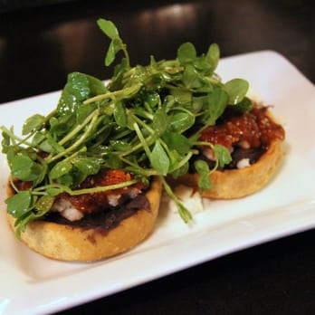 Chilam Balam - Corn masa memelas, black beans, aged goat cheese, arbol salsa and dressed shoots - Mexican Near Me - Chicago, Illinois Chilam Balam - Corn masa memelas, black beans, aged goat cheese, arbol salsa and dressed shoots - Mexican Near Me - Chicago, Illinois