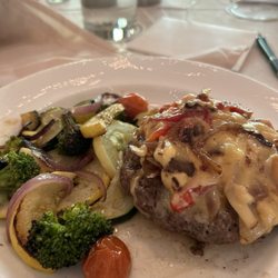 Brassies Grill - Hamburger Steak topped with Smoker Gouda, peppers and onions for lunch.