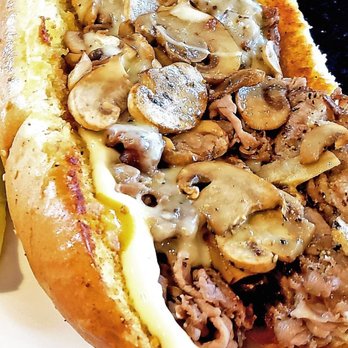 Chomp - Chomp's Monster Philly Steak sandwich w/ plenty of steak, shroons & cheese. It also comes with onions & green peppers which I deleted. $12 - American Near Me - Rochester, Michigan Chomp - Chomp's Monster Philly Steak sandwich w/ plenty of steak, shroons & cheese. It also comes with onions & green peppers which I deleted. $12 - American Near Me - Rochester, Michigan