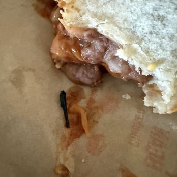 Taco Bell - Live Más Café - Burrito with black plastic inside - Fast Food Near Me - Las Vegas, Nevada