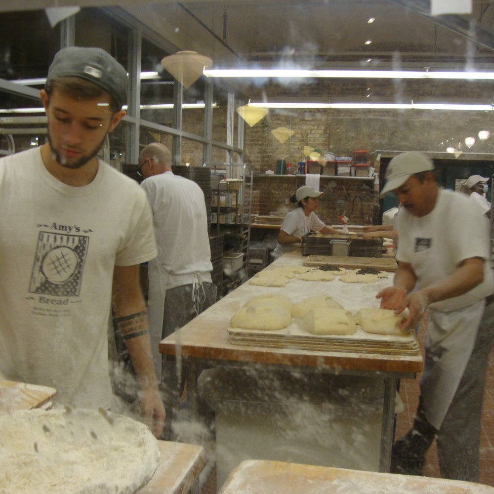 Amy's Bread - back kitchen through the window - Bakeries Near Me - New York, New York Amy's Bread - back kitchen through the window - Bakeries Near Me - New York, New York