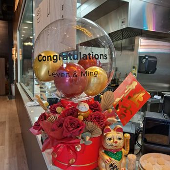 Uncle Dumpling - Congratulations balloon and floral arrangement for the Grand Opening - Noodles Near Me - Roseville, California Uncle Dumpling - Congratulations balloon and floral arrangement for the Grand Opening - Noodles Near Me - Roseville, California