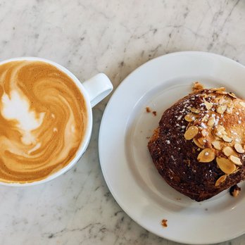Belle Epicurean Bakery - Hot toffee latte with a raspberry lemon almond croissant - Desserts Near Me - Seattle, Washington