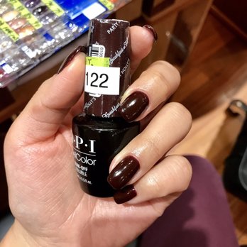 Coco Ruby Nail & Spa - Photo makes it seem like there are marks, but this was after they applied cuticle oil. Mani was nice and shiny :) - Massage Near Me - New York, New York