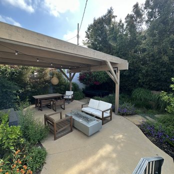 Stout Design Build - Back after (pergola, patio, firepit table, plants etc.) - Landscaping Near Me - Huntington Beach, California