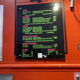 a menu on a food truck
