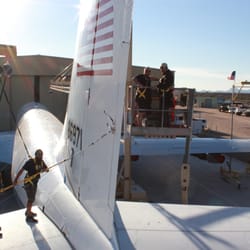 Mighty Fine Auto Detailing - Anthony and Chris waxing the tail of "Air Force One/ FREEDOM ONE"