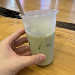 Milk with a spec of matcha