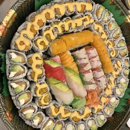 Party tray of sushi. 3 specialty and 7 classic.