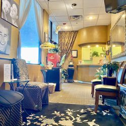 Vegas Smiles - Girl behind the desk deals with most of the patients and has really bad breath. Not a good reflection on the dentist.